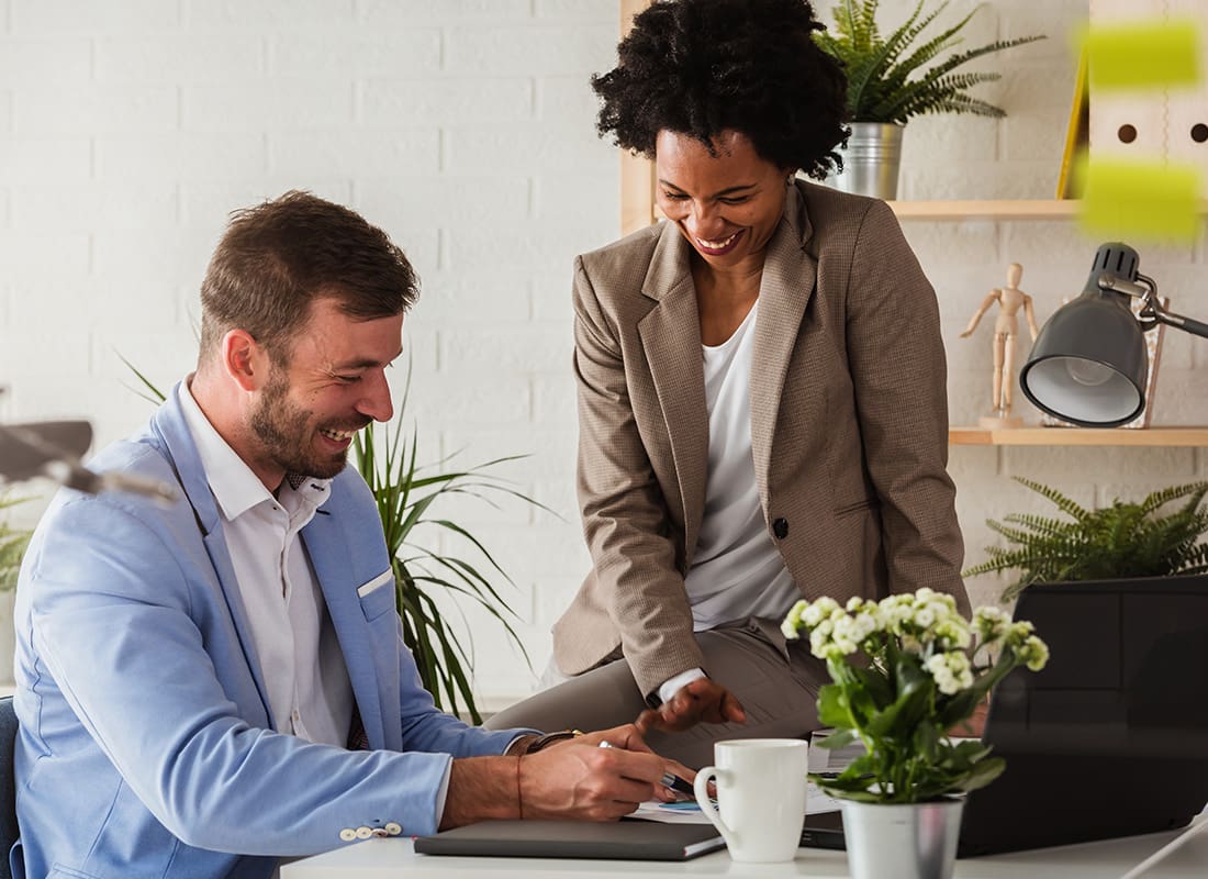 Contact - Business People Discussing Work in Their Creative Office